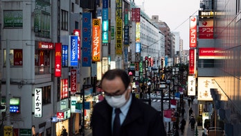 Some Japan hospitals overwhelmed as nation tops 10,000 coronavirus cases