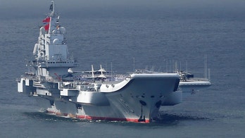 Chinese aircraft carrier sails past Taiwan as US Navy struggles with coronavirus