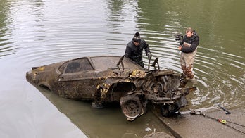 Divers find classic Ford Mustang among 9 cars dumped in Portland river