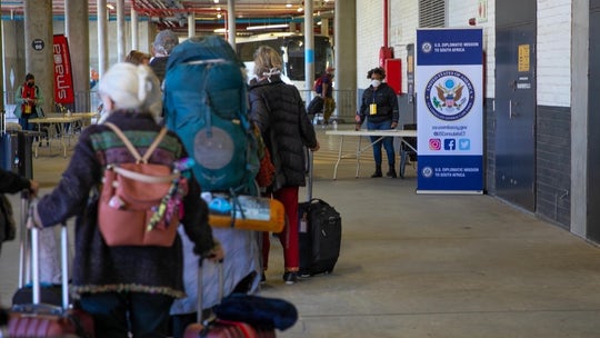 Americans trapped by South Africa's coronavirus lockdown return home