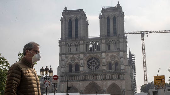 Year after Notre Dame fire, restoration stalled by coronavirus