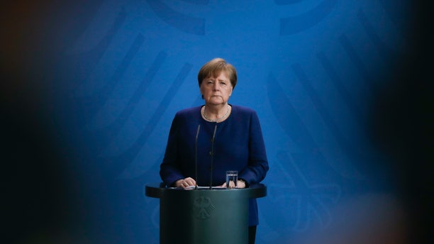 German Chancellor Angela Merkel briefs the media about measures of the German government to avoid further spread of the coronavirus at the chancellery in Berlin, Germany, Monday, April 6, 2020. (AP Photo/Markus Schreiber,Pool)
