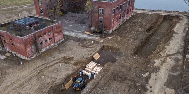 Drone pictures show bodies being buried on New York's Hart Island where the department of corrections is dealing with more burials overall, amid the coronavirus disease (COVID-19) outbreak in New York City, April 9.