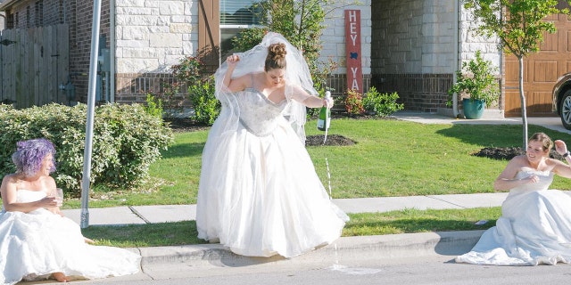 On April 1, photographer Elyssa Seibel gathered five friends in her Georgetown neighborhood for a lighthearted “wedding dress Wednesday” portrait session.