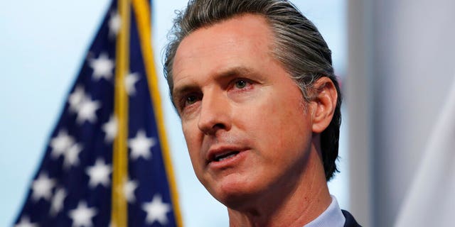 California Gov. Gavin Newsom speaking at a news briefing at the Governor's Office of Emergency Services in Rancho Cordova, Calif. earlier this month. 