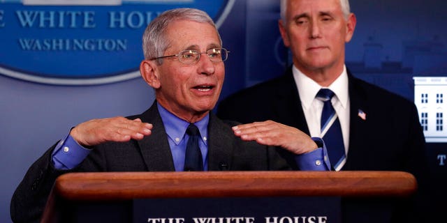 Dr. Anthony Fauci, director of the National Institute of Allergy and Infectious Diseases, speaks about the coronavirus in the James Brady Press Briefing Room of the White House, Tuesday, April 7, 2020, in Washington, as Vice President Mike Pence listens. (AP Photo/Alex Brandon)