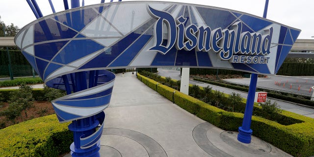 In this photo taken Wednesday, March 18, 2020, one of the normally bustling entrances to the Disneyland resort is vacant due to the coronavirus closure in Anaheim, Calif. (AP Photo/Chris Carlson)