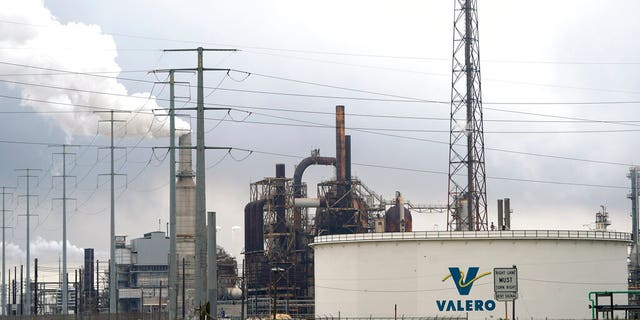 The Valero Port Arthur Refinery is shown Monday, March 23, 2020, in Port Arthur, Texas. The Texas Gulf Coast is the United States’ petrochemical corridor, with four of the country’s 10 biggest oil and gas refineries and thousands of chemical facilities. (AP Photo/David J. Phillip)