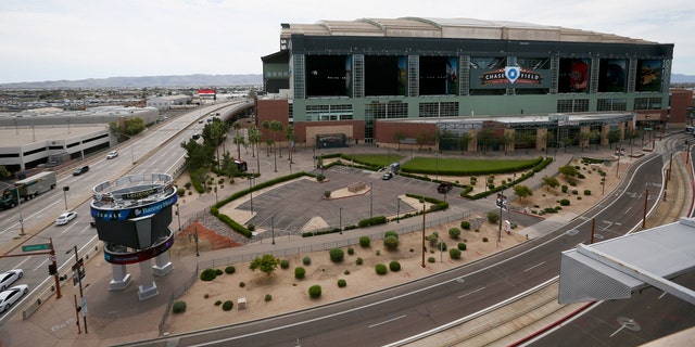 The Arizona Diamondbacks would have hosted the Atlanta Braves in their season-opening baseball game March 26 in Phoenix, but the start of the MLB regular season is indefinitely on hold because of the coronavirus pandemic. (AP Photo/Ross D. Franklin)