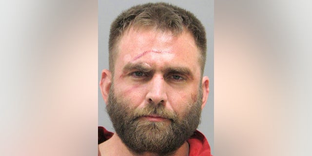 This undated photo from the Henderson, Nev., Police Department shows Joshua Nichols. Authorities say Nichols, the 37-year-old son of convicted Oklahoma City bombing co-conspirator Terry Nichols, is facing kidnapping, burglary and armed robbery charges in a Feb. 6 attack on a 67-year-old man in suburban Las Vegas.