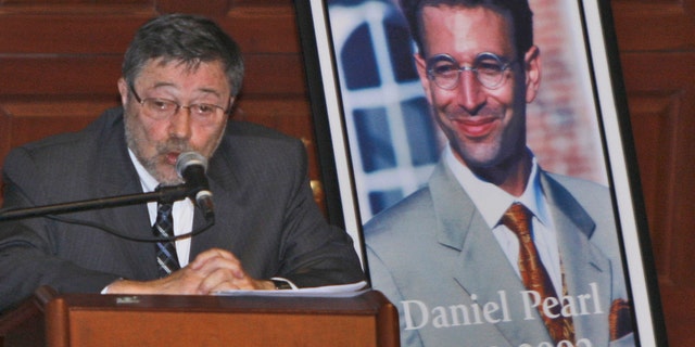 Dr. Judea Pearl, father of American journalist Daniel Pearl, who was killed by terrorists in 2002, speaks in Miami Beach, Fla in 2007. A Pakistani court on Thursday, April 2, 2020, overturned the murder conviction of a British Pakistani man found guilty of the kidnapping and murder of Wall Street journalist Daniel Pearl. (AP Photo/Wilfredo Lee, File)