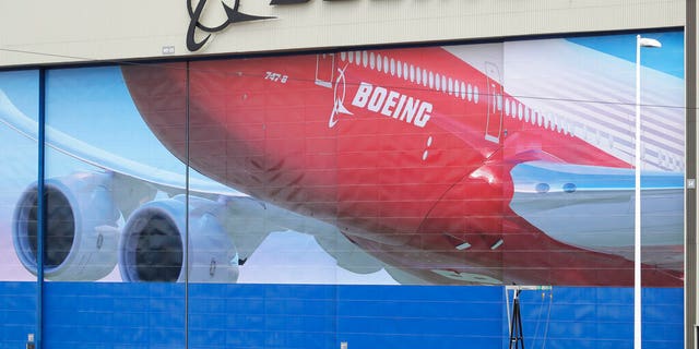 A mural of a Boeing 747-8 airplane is seen at the company's manufacturing facility in Everett, Wash., north of Seattle, March 23, 2020. (Associated Press)