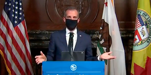 Los Angeles Mayor Garcetti wearing a protective face mask during his daily coronavirus news conference in Los Angeles on April 1. Garcetti is currently conducting all briefings and interviews remotely. (Office of Mayor Eric Garcetti via AP, File)