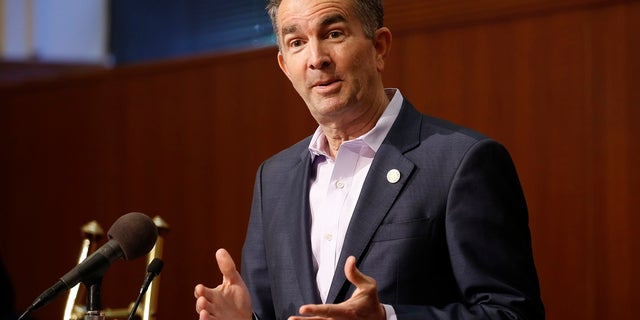 Virginia Gov. Ralph Northam gestures during a news conference at the Virginia Capitol. Northam endorsed former Gov. Terry McAuliffe in his 2021 bid to get back into the governor's mansion on Thursday. (AP Photo/Steve Helber)