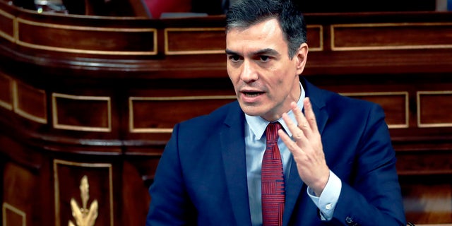 Spain’s Prime Minister, Pedro Sanchez speaks at a parliamentary session in Madrid, Spain, Thursday. Sanchez acknowledged that Spain’s government, and its regions which administer health services, were caught off guard by the crisis and left its hospitals woefully short on critical supplies, including virus tests and protective clothing for medical workers.(Mariscal, Pool photo via AP)