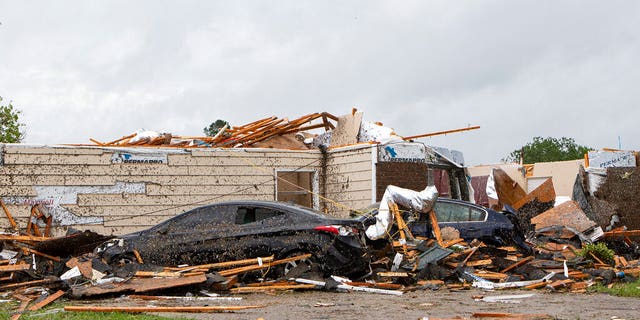 A home had its roof torn off after a tornado ripped through Monroe, La.