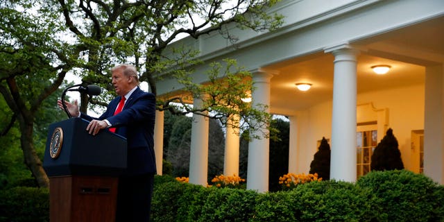 President Donald Trump speaks about the coronavirus in the Rose Garden of the White House, Tuesday, April 14, 2020, in Washington. (AP Photo/Alex Brandon)