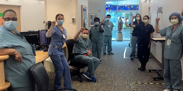 In this image provided by Lizabeth Baker Wade, nurses at Providence Saint John's Health Center in Santa Monica, Calif.(Lizabeth Baker Wade via AP)