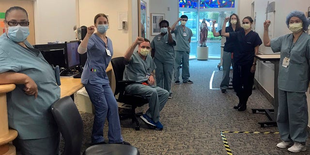 In this image provided by Lizabeth Baker Wade, nurses at Providence Saint John's Health Center in Santa Monica, Calif.(Lizabeth Baker Wade via AP)