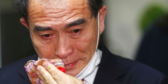 Thae Yong Ho, former North Korean diplomat, who defected to South Korea in 2016 and a candidate of the main opposition United Future Party, wipes his tear after he was certain to secure victory in the parliamentary elections in Seoul, South Korea, Thursday, April 16, 2020. Thae on Thursday won a constituency seat in South Korea’s parliamentary elections, the first such achievement among tens of thousands of North Koreans who have fled their authoritarian, impoverished homeland.