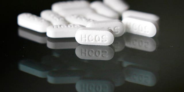 FILE: An arrangement of hydroxychloroquine pills in Las Vegas. O
