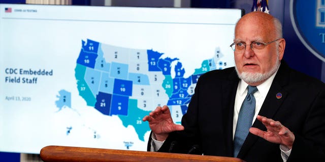 Dr. Robert Redfield, former director of the Centers for Disease Control and Prevention, speaks about the coronavirus in the James Brady Press Briefing Room of the White House, Friday, April 17, 2020, in Washington. (AP Photo/Alex Brandon)