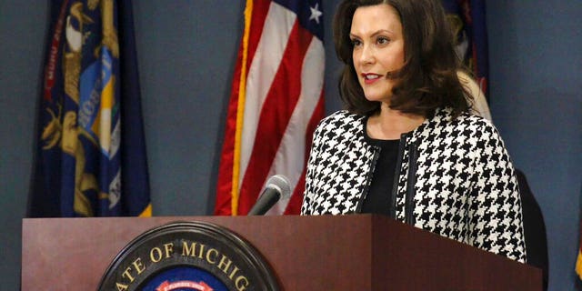 In this photo, provided by the Michigan Office of the Governor, Michigan Gov. Gretchen Whitmer addresses the state in Lansing, Mich., Monday, April 20, 2020. (Michigan Office of the Governor via AP, Pool)