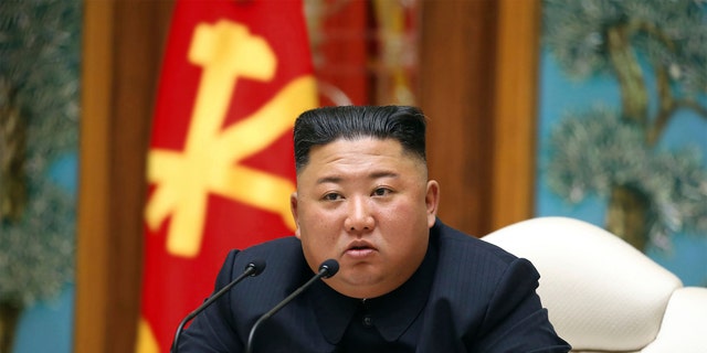 In this April 11 file photo provided by the North Korean government, North Korean leader Kim Jong Un attends a politburo meeting of the ruling Workers' Party of Korea in Pyongyang.