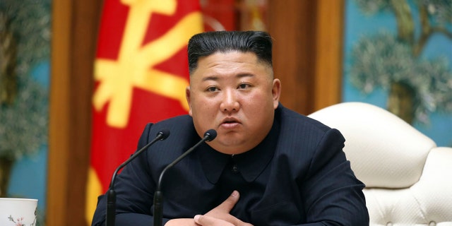 In this April 11 file photo provided by the North Korean government, North Korean leader Kim Jong Un attends a politburo meeting of the ruling Workers' Party of Korea in Pyongyang.