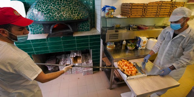 Naples is reportedly home to over 900 pizzerias, the most of any Italian city. (AP Photo/Andrew Medichini)