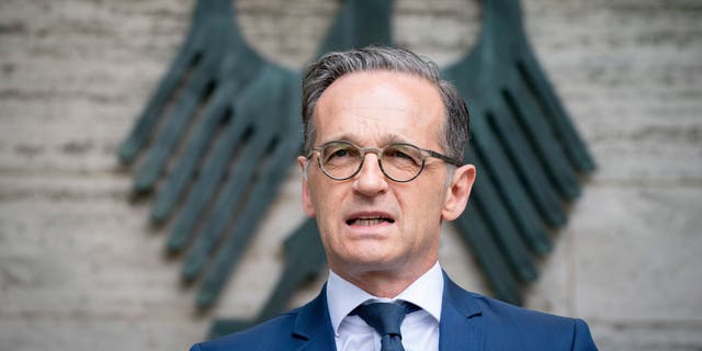 German Foreign Minister Heiko Maas announces the extension of the worldwide travel warning of the government in due to the coronavirus outbreak in front of the Foreign Ministry in Berlin, Germany. Wednesday, April 29, 2020. The worldwide travel warning will initially last until 14 June 2020.