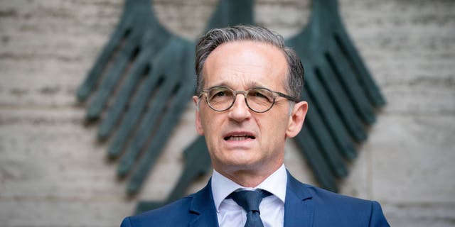 German Foreign Minister Heiko Maas announces the extension of the worldwide travel warning of the government in due to the coronavirus outbreak in front of the Foreign Ministry in Berlin, Germany. Wednesday, April 29, 2020. The worldwide travel warning will initially last until 14 June 2020.