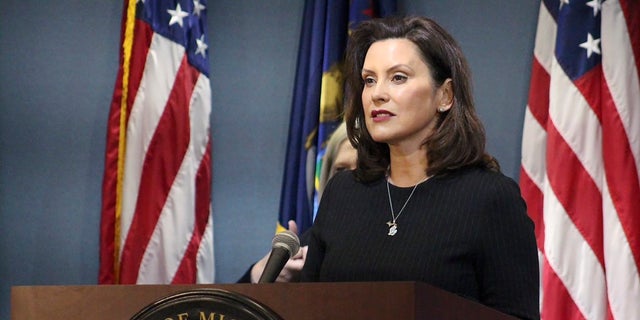 Michigan Gov. Gretchen Whitmer extended her state of emergency Thursday, hours after the Legislature adjourned a meeting without doing so amid a protest inside the state Capitol building where some demonstrators were armed. (Michigan Office of the Governor via AP, Pool)