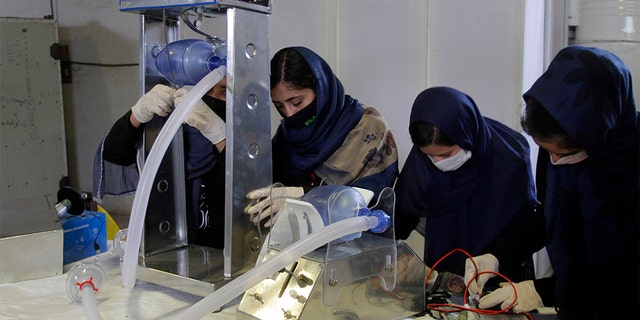 Afghanistan’s prize-winning girls’ robotics team has been working to help first responders battle the coronavirus. (AP Photo/Hamed Safarazi)