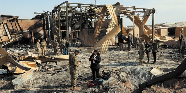 Media outlets visit one of the many impact sites created by the recent missile attacks at Al Asad Air Base, Iraq, Jan. 13, 2020. (U.S. Army photo by Spc. Derek Mustard)