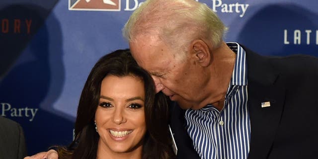 Nov. 1, 2014: Then-Vice President Joe Biden with actress Eva Longoria in Las Vegas. 