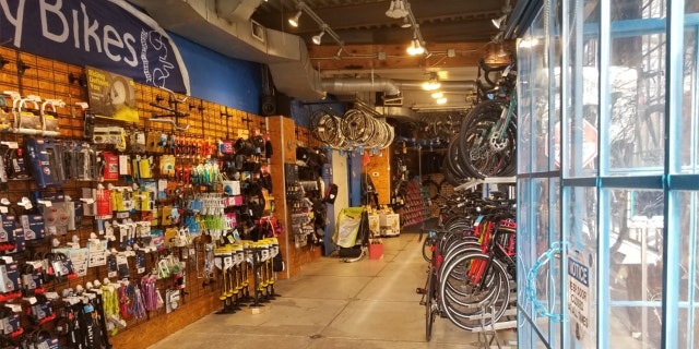 An empty portion of the CityBike of the store which is limited to a certain amount of employees working in the area. CityBike assists customers one-on-one to avoid crowds of people in store.