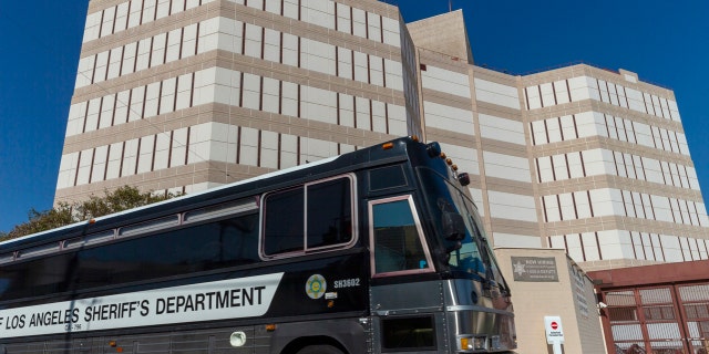 A Los Angeles County Sheriff's Department prisoner transportation bus leaves the Twin Towers Correctional Facility in Los Angeles on Wednesday, April 1, 2020.
