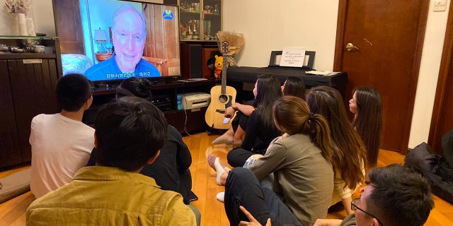 A group of young adults in Hong Kong tune into Pulse’s Good Friday service Friday, April 10.