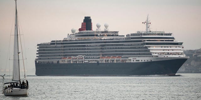 The MS Queen Victoria, seen here in January, outside of Lisbon, Portugal, is one of the three Cunard Cruises ships that will remain non-operational through the end of summer. Cunard is one of several other cruise lines, some of which are owned by Carnival and Norwegian, to recently extended its voluntary suspension of operations.