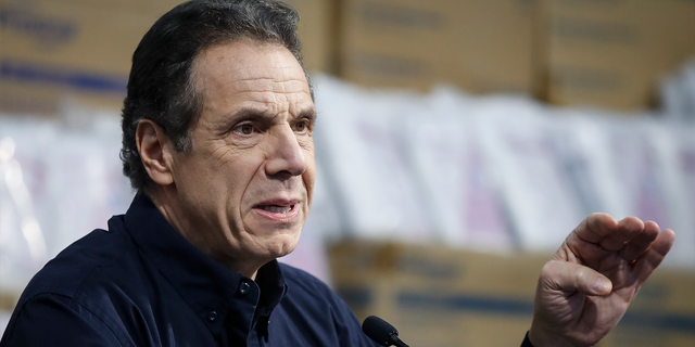 In this March 24, 2020 file photo, New York Gov. Andrew Cuomo speaks during a news conference in New York. President Donald Trump declared that states could “call your own shots” in determining how and when to loosen restrictions on businesses and social gatherings.