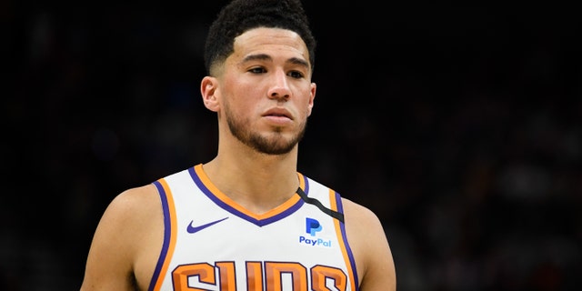 SALT LAKE CITY, UT - FEBRUARY 24: Devin Booker #1 of the Phoenix Suns looks on during a game against the Utah Jazz at Vivint Smart Home Arena on February 24, 2020 in Salt Lake City, Utah. NOTE TO USER: User expressly acknowledges and agrees that, by downloading and/or using this photograph, user is consenting to the terms and conditions of the Getty Images License Agreement. (Photo by Alex Goodlett/Getty Images)