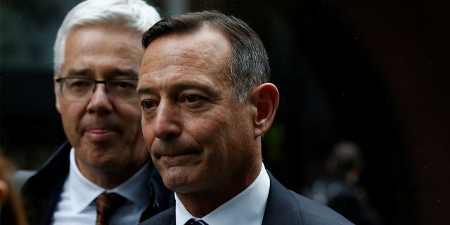 Douglas Hodge, the former chief executive of the investment firm Pimco, leaves the federal courthouse after being sentenced in connection with a nationwide college admissions cheating scheme in Boston. (REUTERS/Katherine Taylor)