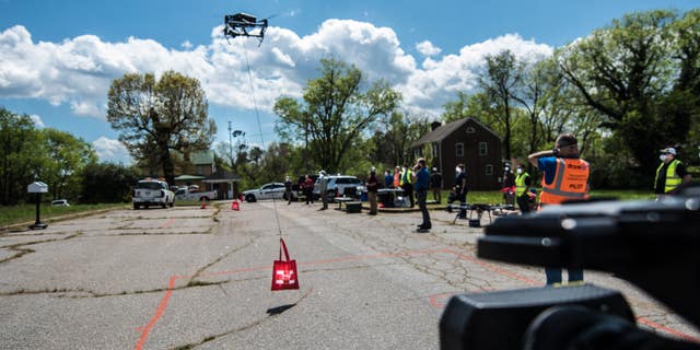 DJI Inspire 2 drone holding the test payload (Credit: DroneUp)
