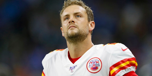 In this Sept. 29, 2019, file photo, Kansas City Chiefs punter Dustin Colquitt (2) watches during an NFL game against the Detroit Lions in Detroit. (AP Photo/Paul Sancya, Fle)