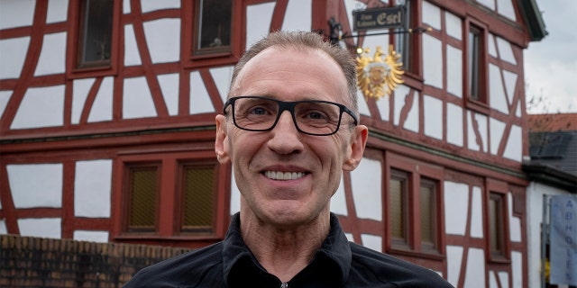 Thomas Metzmacher made some changes to his apple cider restaurant, Zum Lahmen Esel, in Frankfurt, Germany. (AP Photo/Michael Probst)