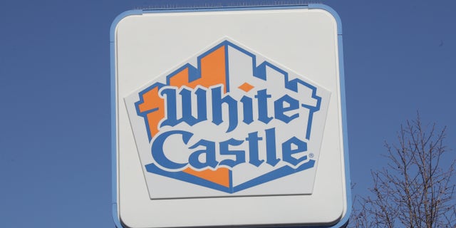 A White Castle store sign is seen on March 26 in Huntington Station, New York. Across the country schools, businesses and places of work have either been shut down or are restricting hours of operation as health officials try to slow the spread of COVID-19.