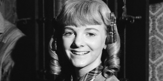 Alison Arngrim as Nellie Oleson.