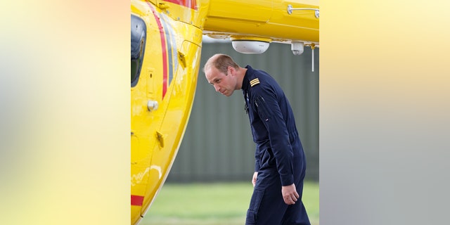Prince William, Duke of Cambridge attends the opening, by Queen Elizabeth II, of the East Anglian Air Ambulance base at Cambridge Airport on July 13, 2016, in Cambridge, England.