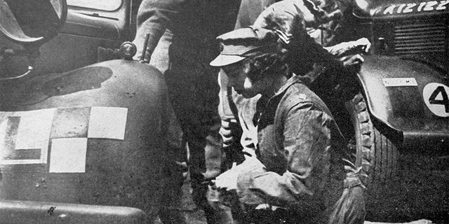 Princess (later Queen ) Elizabeth of Great Britain doing technical repair work during her World War II military service, 1944.